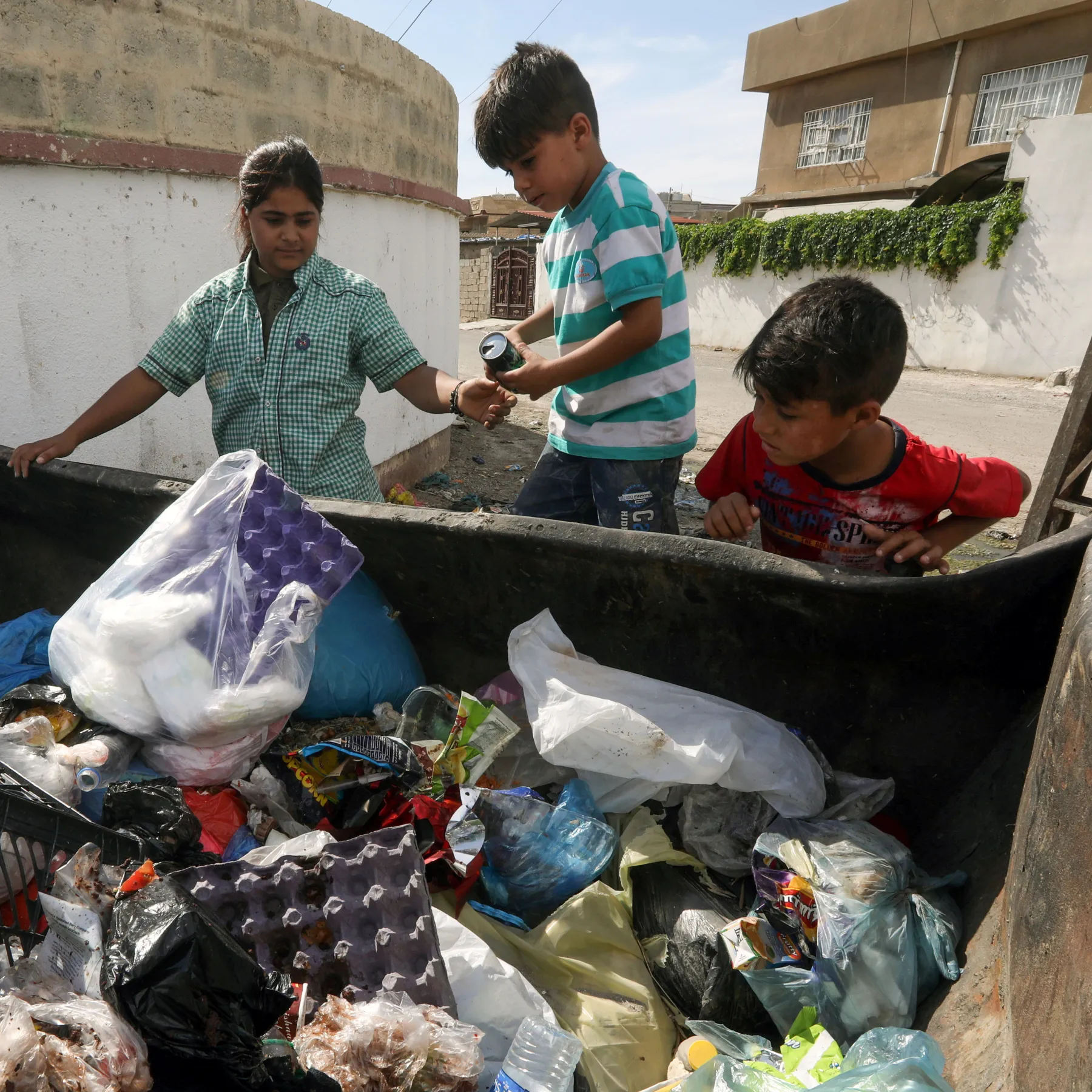 2021-05-POVE-RTY-KIRKUK-GIRL