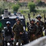 Protesters clash with Israeli forces following the funeral of Palestinian Mohammed Ghoneim, near Bethlehem